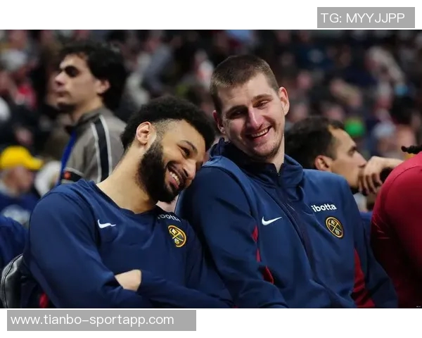 申京赛后与约基奇亲密互动展现友谊与尊重的瞬间